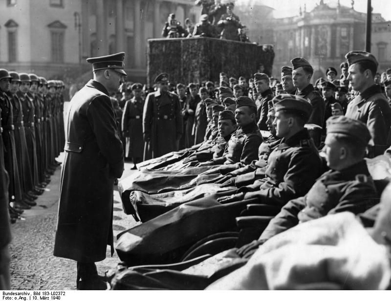 Adolf Hitler talks to wounded soldiers in Berlin for the Heldengetenktag